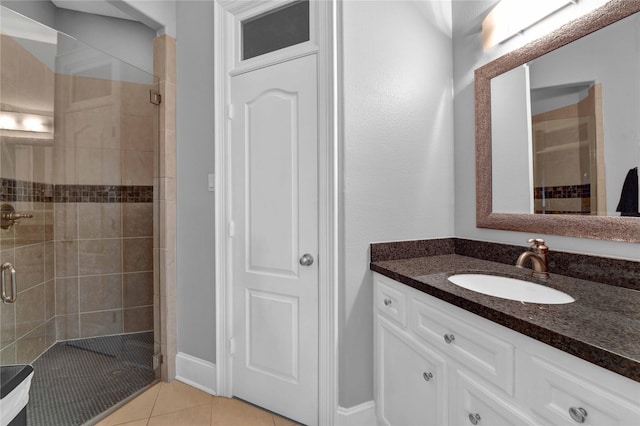 7611 Kings River Ln, Humble, TX 77346 - bathroom featuring a stall shower, vanity, and tile patterned flooring
