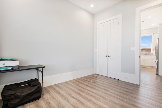 office space featuring light hardwood / wood-style floors