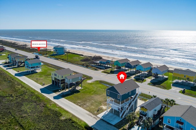 aerial view with a beach view and a water view