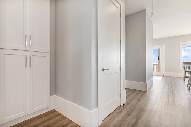 corridor featuring light hardwood / wood-style flooring