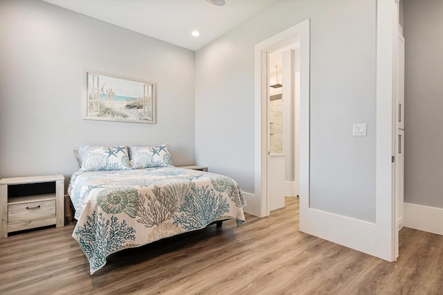 bedroom with light hardwood / wood-style flooring