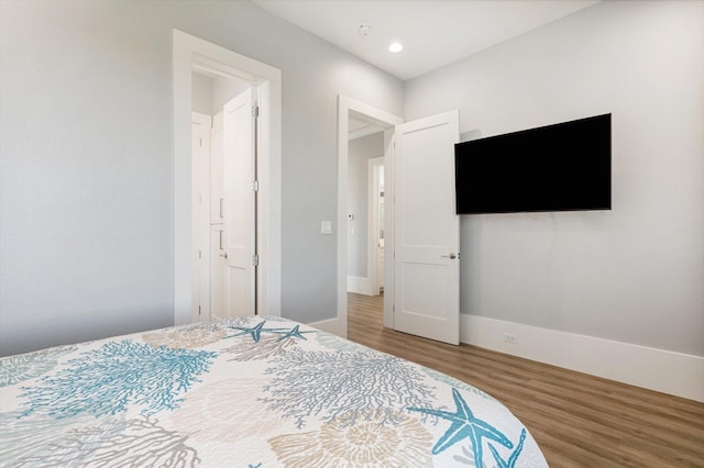 bedroom featuring wood-type flooring