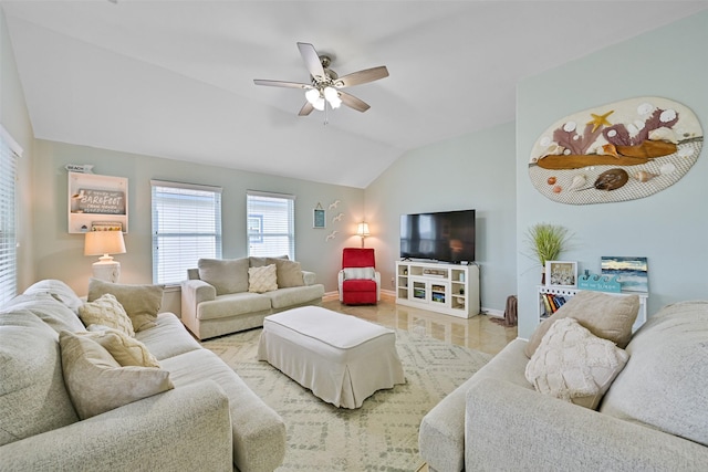 living room featuring ceiling fan and vaulted ceiling