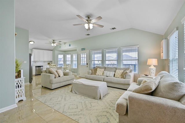 living room with lofted ceiling and ceiling fan