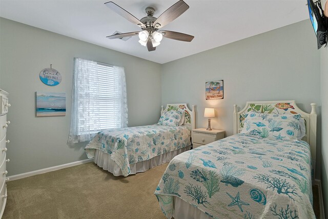 23178 Fresca St, Galveston, TX 77554 - bedroom featuring baseboards, ceiling fan, and carpet floors