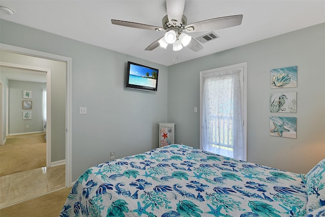 23178 Fresca St, Galveston, TX 77554 - bedroom featuring a ceiling fan, light carpet, visible vents, and baseboards