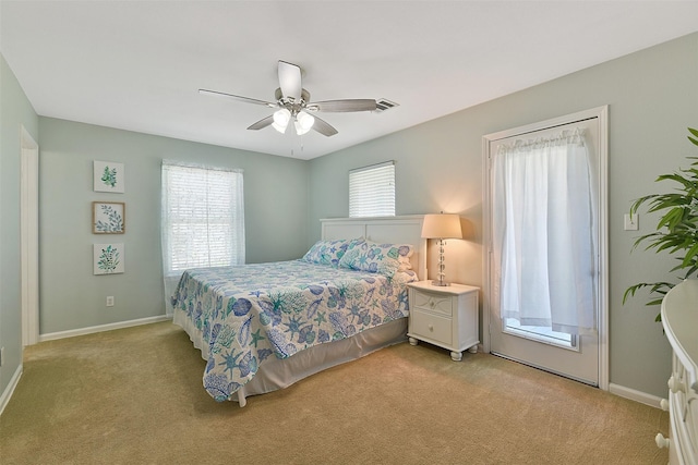23178 Fresca St, Galveston, TX 77554 - bedroom featuring light carpet, baseboards, and a ceiling fan