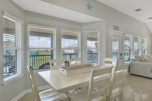 23178 Fresca St, Galveston, TX 77554 - dining area featuring plenty of natural light, baseboards, and visible vents