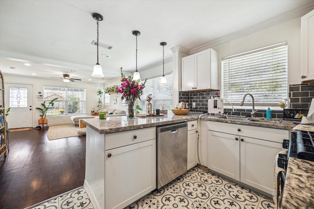 kitchen featuring stainless steel dishwasher, ornamental molding, kitchen peninsula, and white cabinets