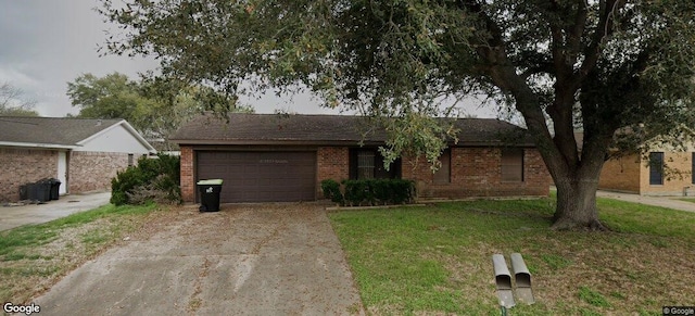 ranch-style house featuring a garage and a front yard