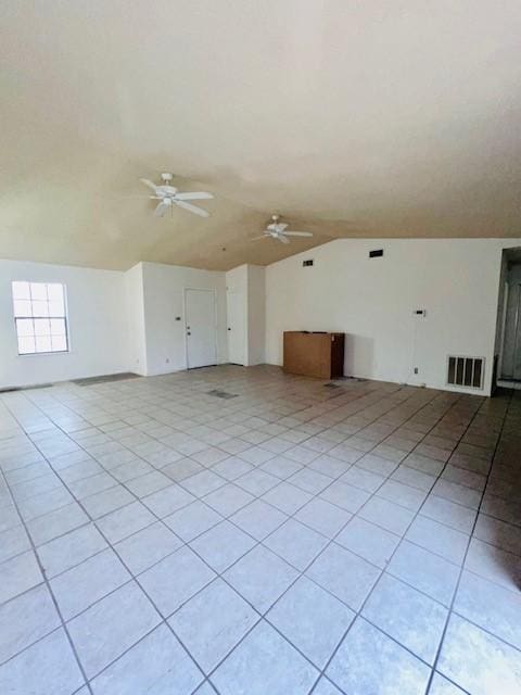 bonus room featuring vaulted ceiling, ceiling fan, and light tile patterned flooring