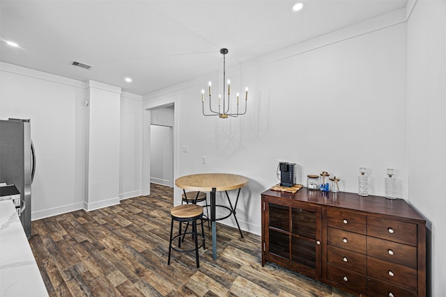 dining area featuring dark hardwood / wood-style floors