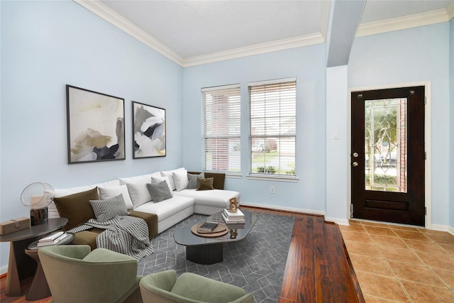 tiled living room featuring ornamental molding