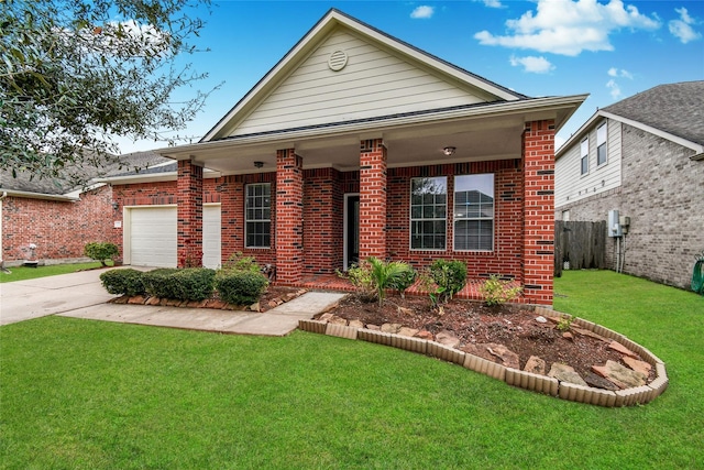 view of front of home featuring a garage, a front yard, and covered porch