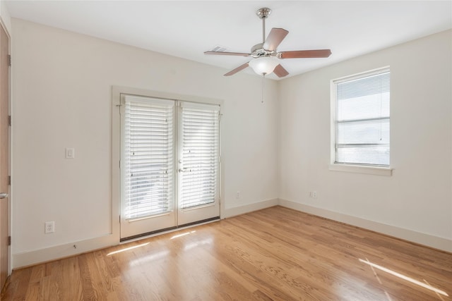 unfurnished room with ceiling fan and light hardwood / wood-style flooring