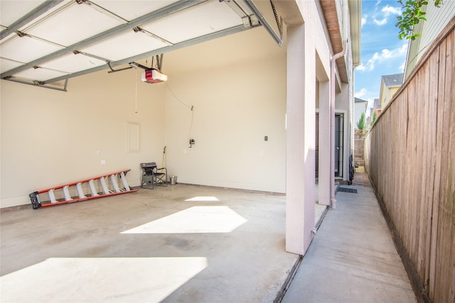 garage featuring a garage door opener