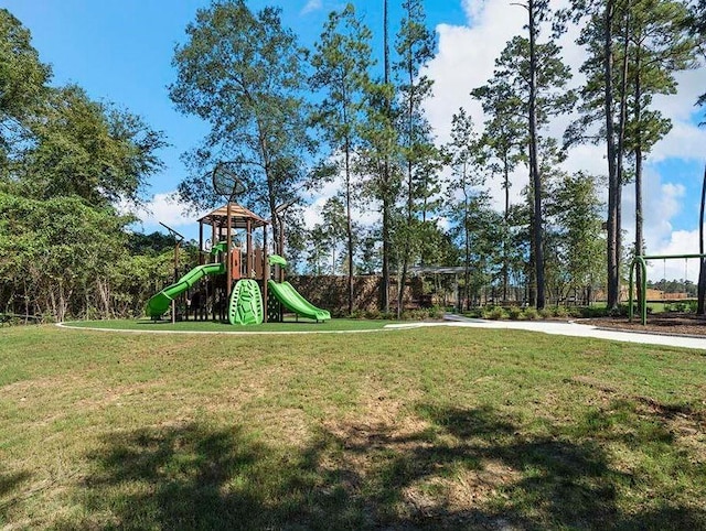 view of playground with a yard