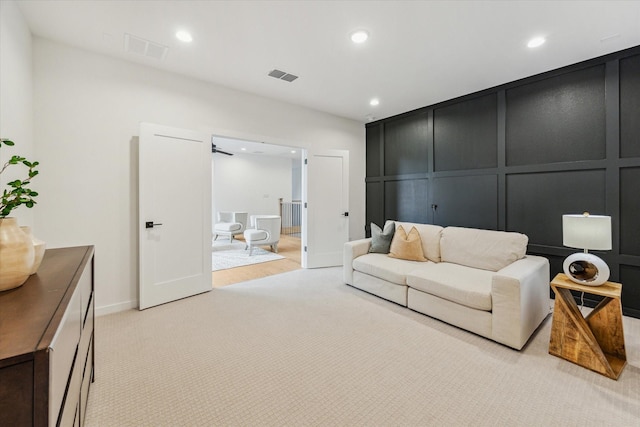 living room featuring light colored carpet