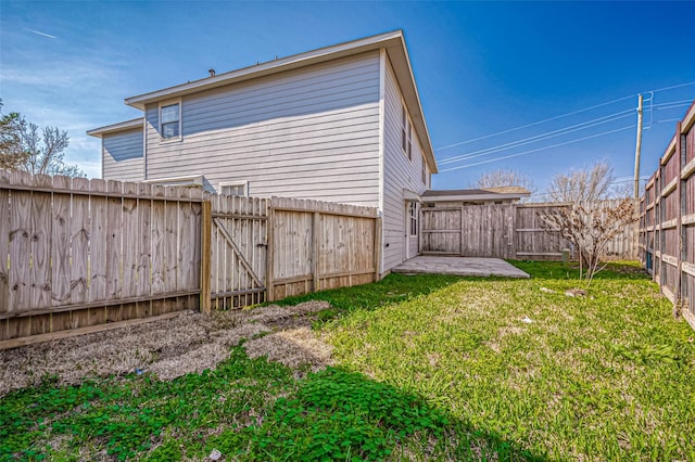 rear view of property with a lawn