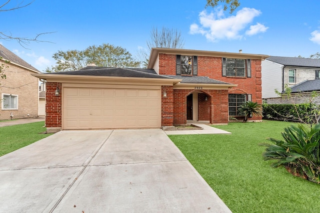 view of property featuring a garage and a front yard