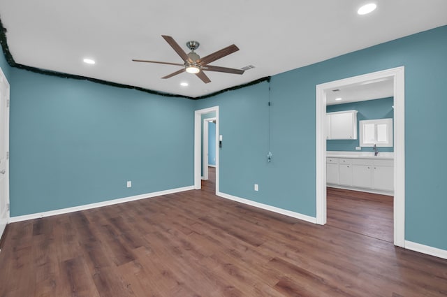 617 4th Ave N, Texas City, TX 77590 - unfurnished room featuring ceiling fan, dark wood-style flooring, and recessed lighting