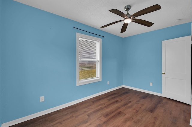 617 4th Ave N, Texas City, TX 77590 - empty room featuring dark wood finished floors and ceiling fan