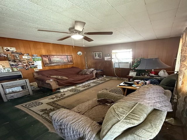 miscellaneous room featuring wooden walls, cooling unit, and ceiling fan