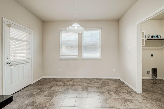 view of unfurnished dining area