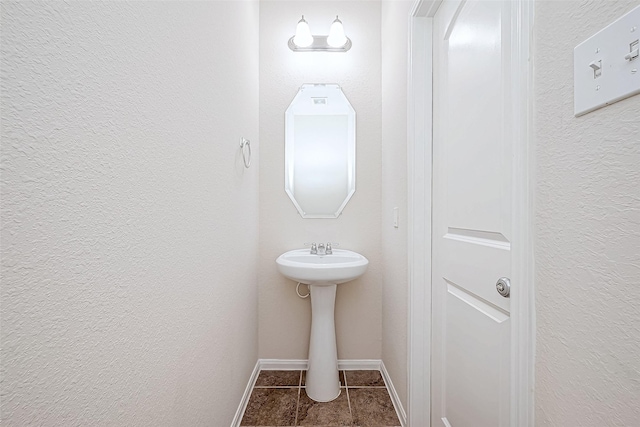 bathroom with tile patterned flooring