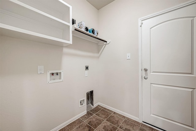 washroom with hookup for a washing machine, dark tile patterned floors, and hookup for an electric dryer