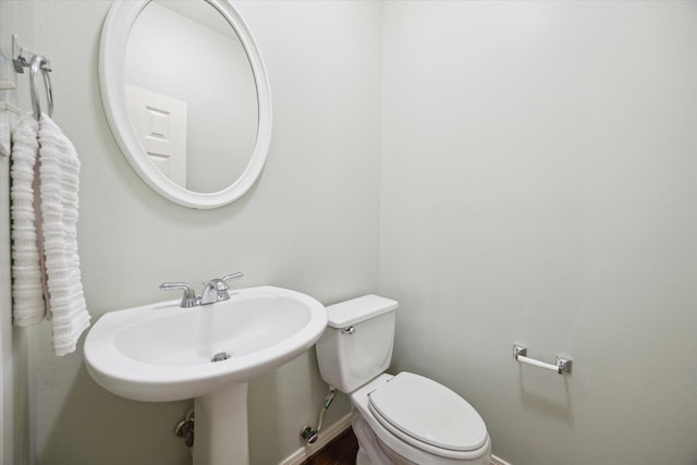 bathroom featuring toilet