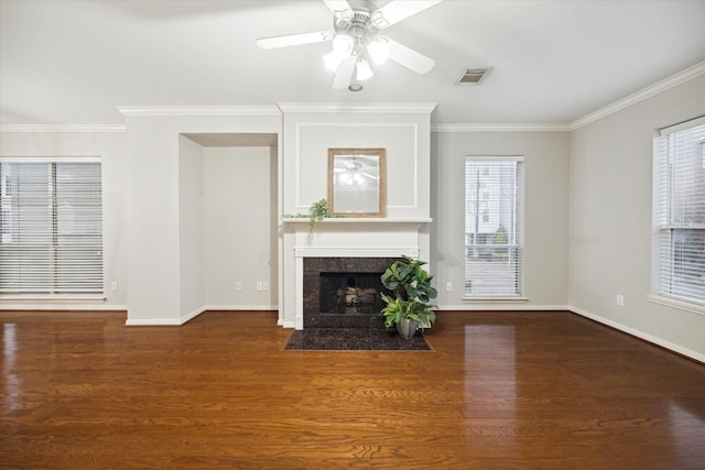 unfurnished living room with crown molding, ceiling fan, and dark hardwood / wood-style flooring