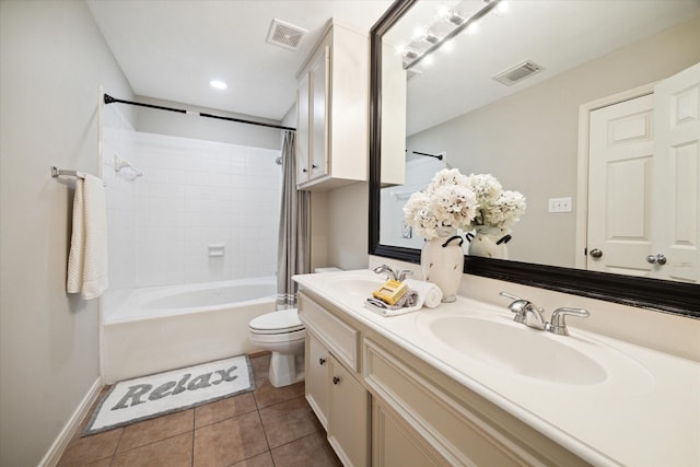 full bathroom featuring shower / tub combo, vanity, tile patterned floors, and toilet