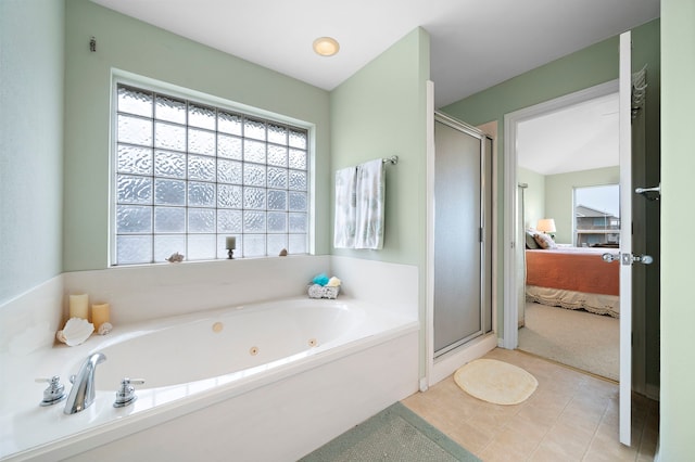 bathroom featuring tile patterned floors and plus walk in shower