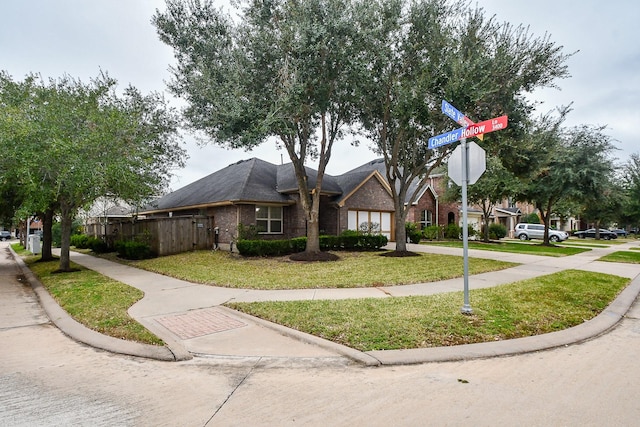 view of front facade with a front lawn