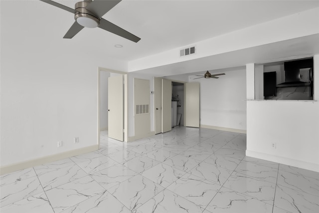 spare room featuring ceiling fan