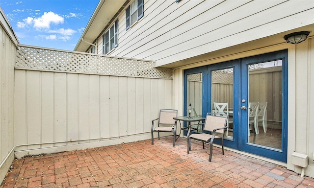 view of patio featuring french doors