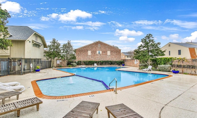 view of pool featuring a patio and pool water feature