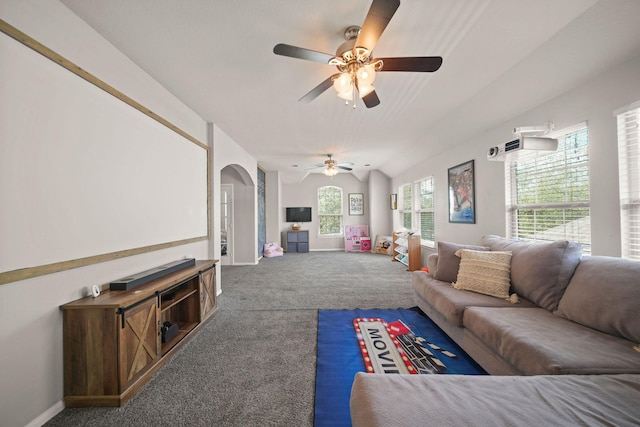 carpeted living room featuring lofted ceiling