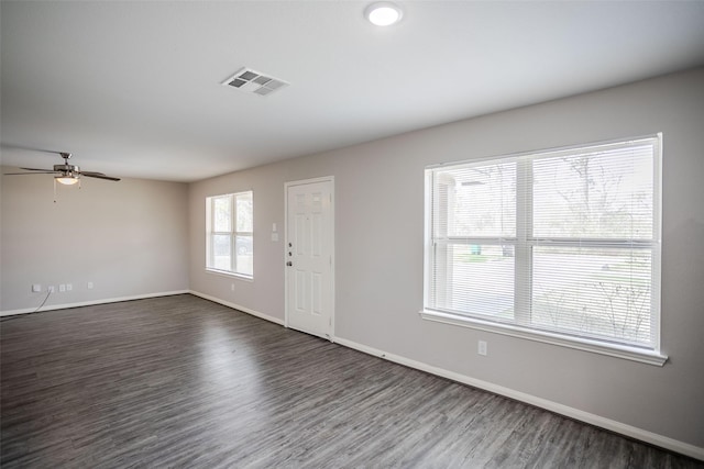 entryway featuring ceiling fan and dark hardwood / wood-style flooring