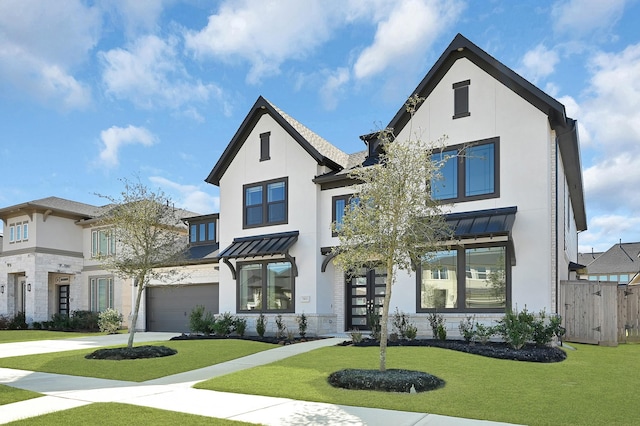 modern farmhouse style home featuring a front yard