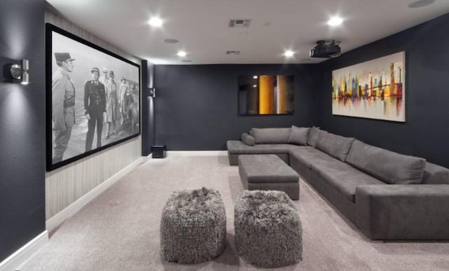 home theater with light colored carpet