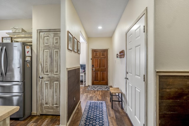 hallway featuring dark hardwood / wood-style flooring