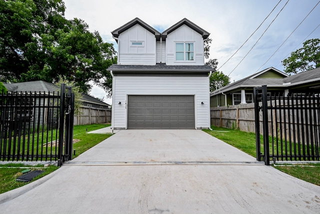 1415 E 35th St, Houston, TX 77022 - view of front facade with a garage, concrete driveway, and board and batten siding