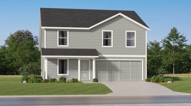 view of front of property with a garage and a front yard