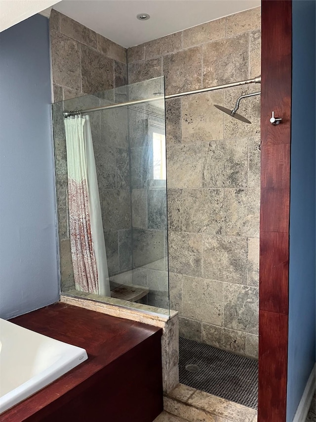 bathroom featuring curtained shower