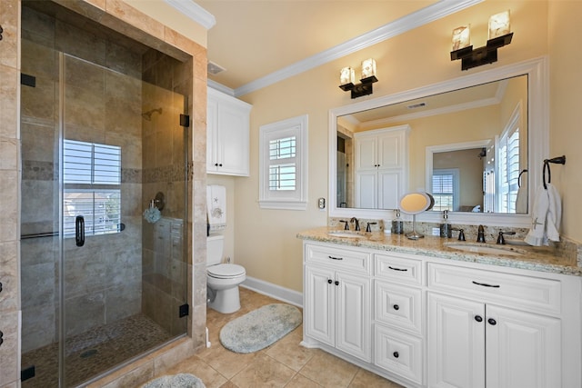 bathroom with tile patterned floors, crown molding, an enclosed shower, and vanity