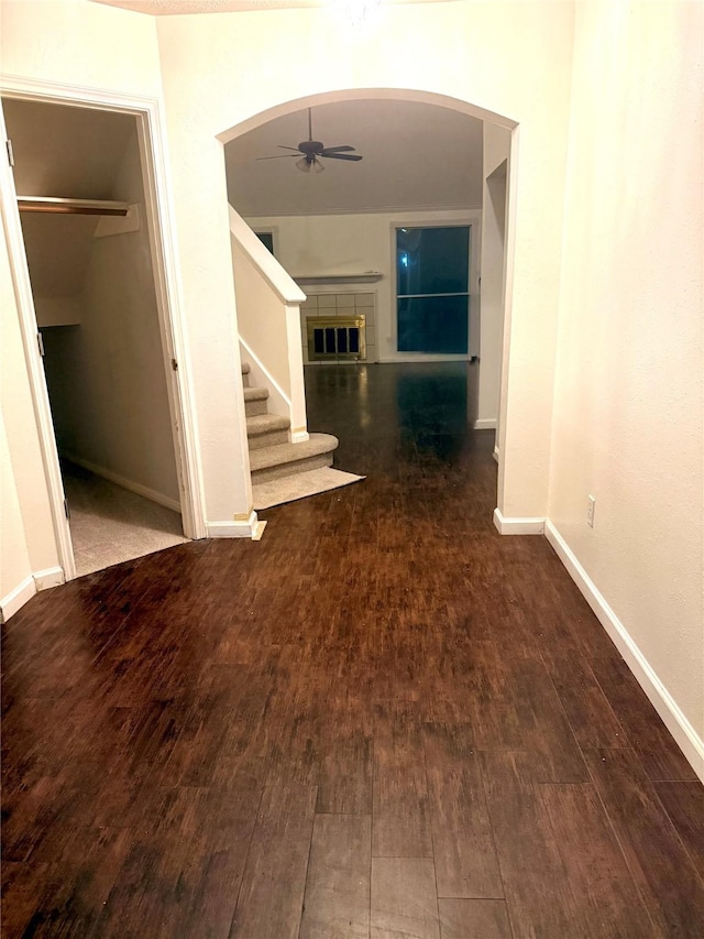 hall with dark hardwood / wood-style flooring