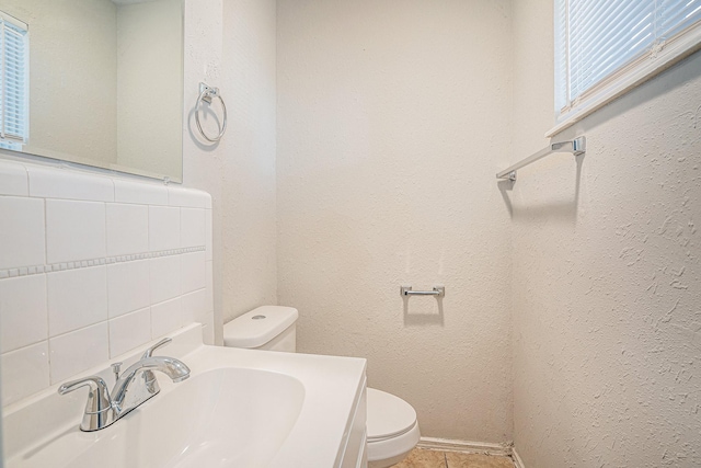 bathroom with sink and toilet