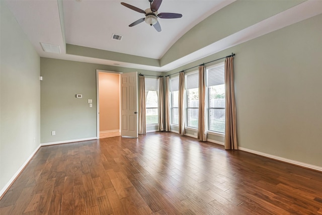 unfurnished room with lofted ceiling, dark hardwood / wood-style floors, and ceiling fan